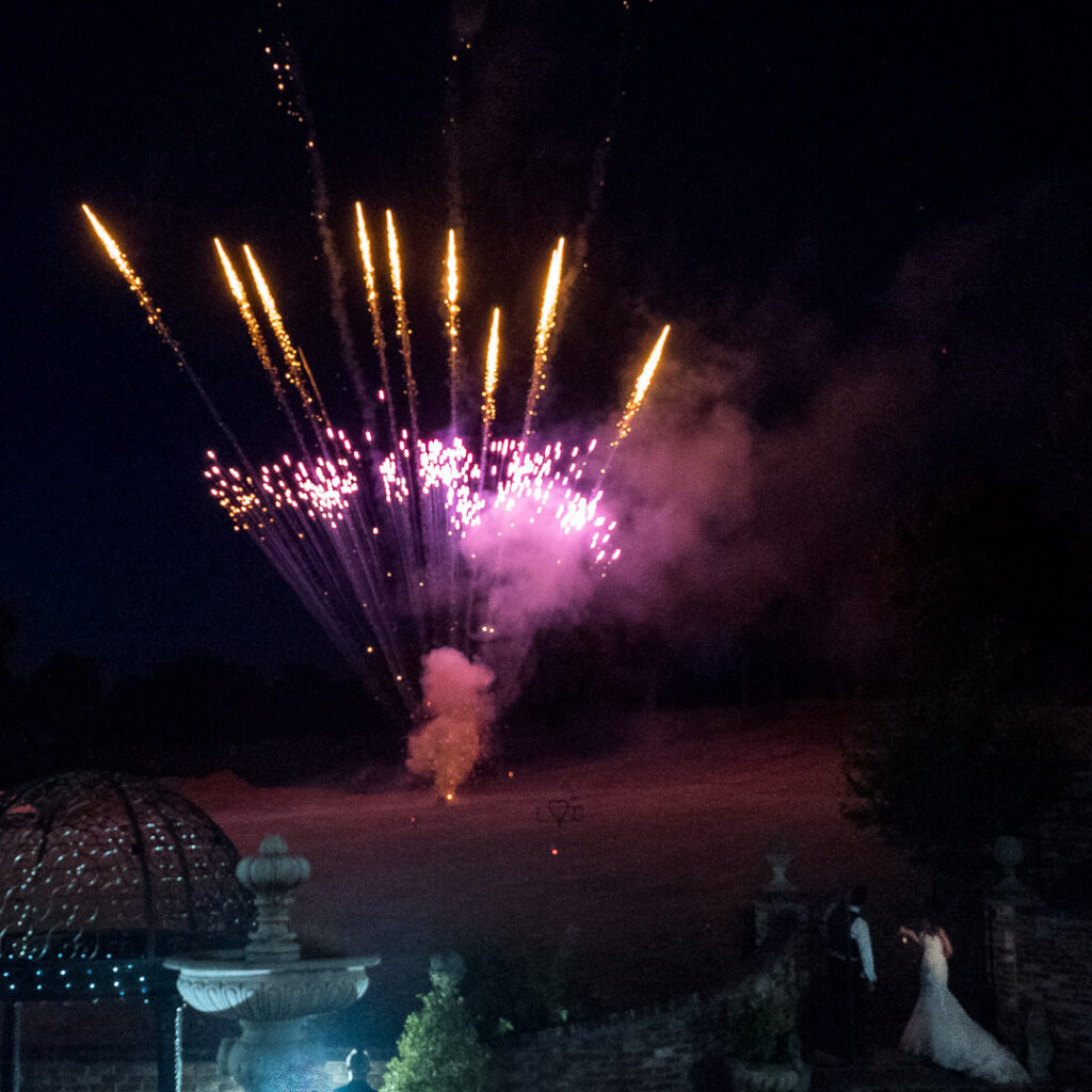 Bride and groom enjoy fireworks finale to their wedding day