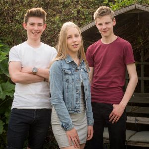 Three teenagers in Romsey cottage garden