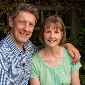 Middle-aged couple in Romsey cottage garden