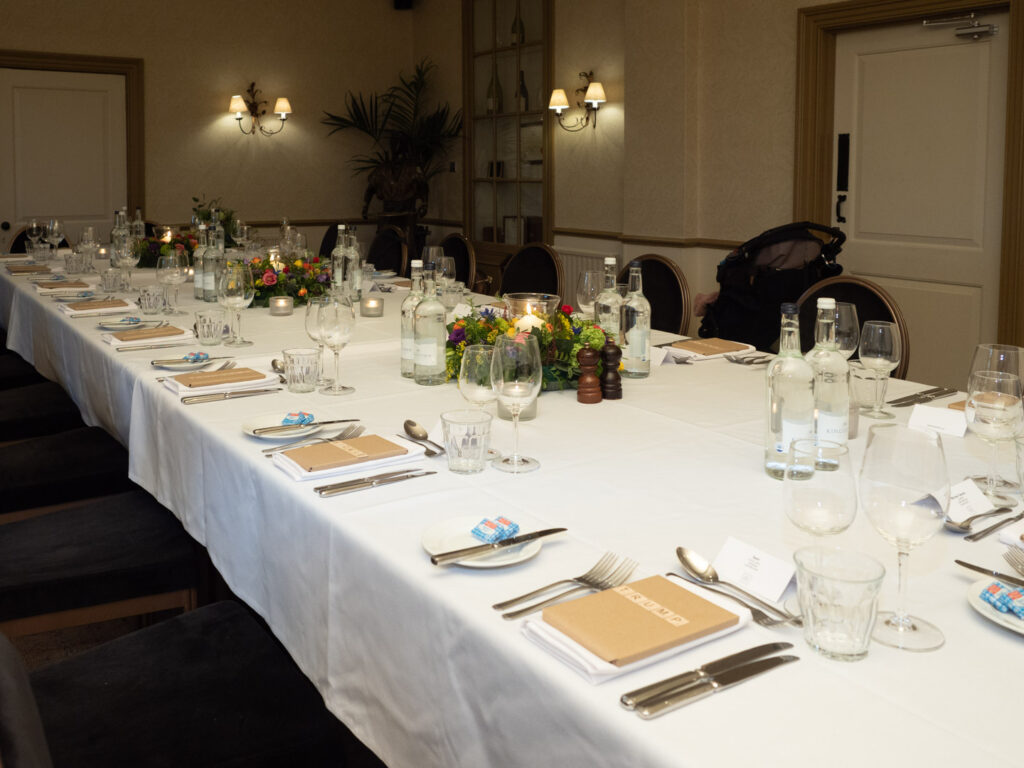Long table laid for dinner in the Hotel du Vin, Winchester