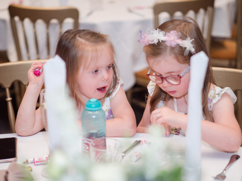 Little girls at wedding reception