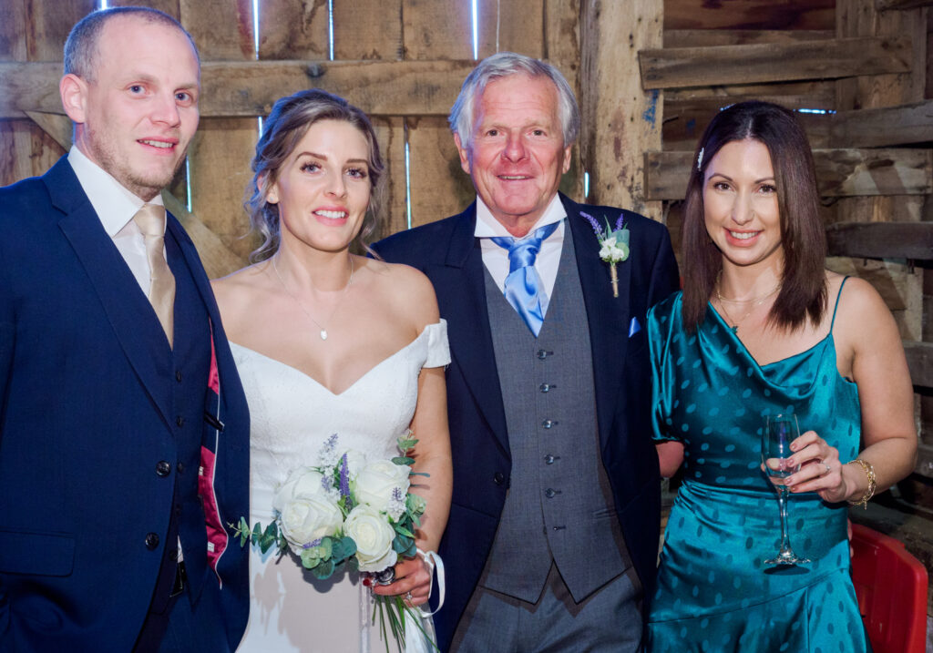 Bride and family in Titchfield Great Barn