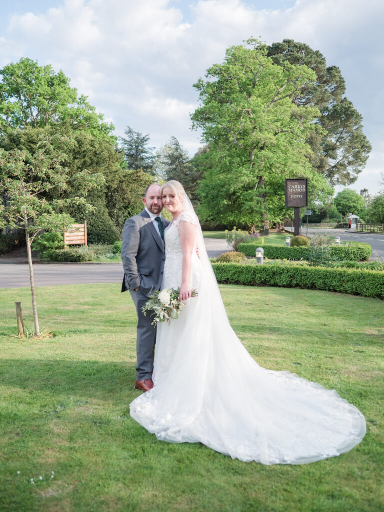 Bride and groom on the lawn at Carey's Manor