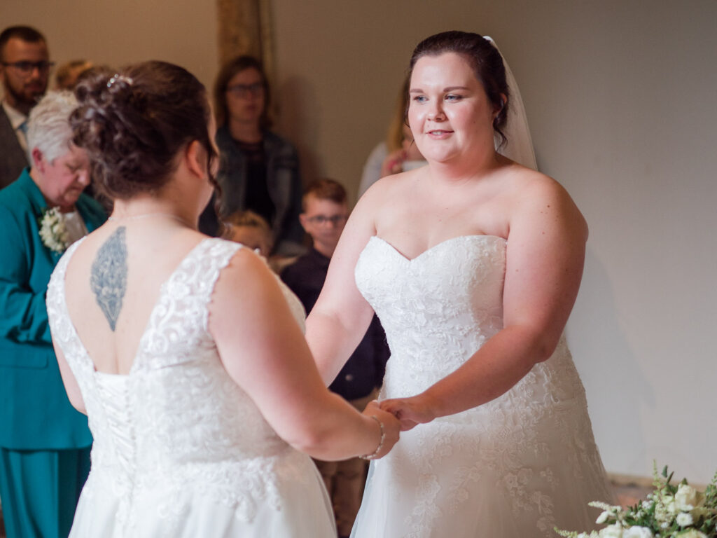 Bride makes her vows to her bride