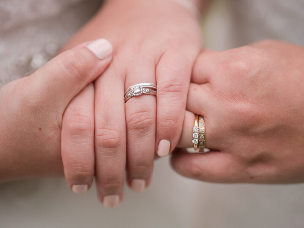 Brides show off their wedding rings