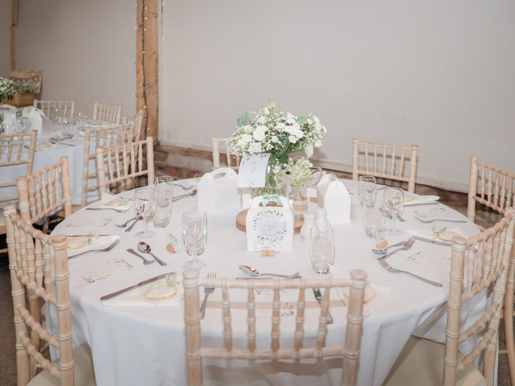 Rustic table decorated for a wedding breakfast