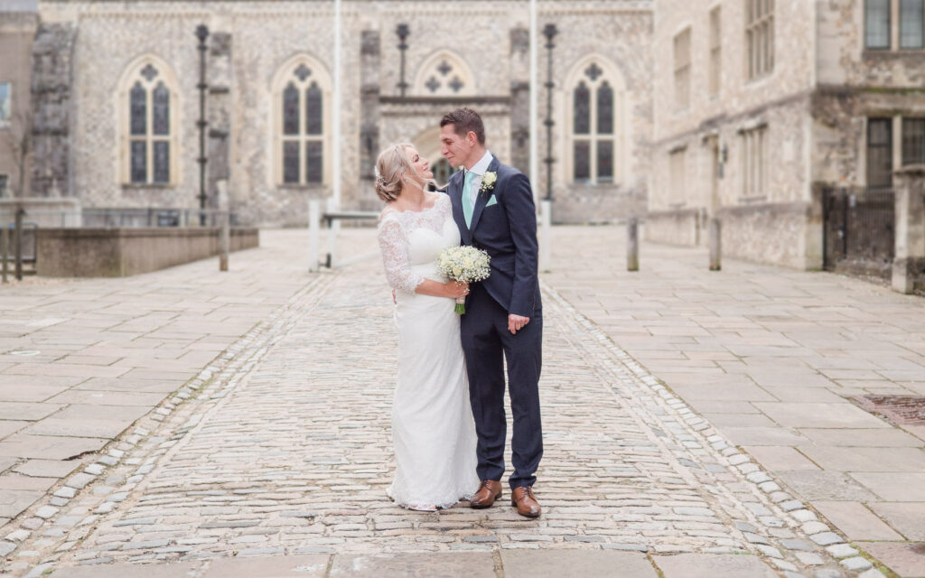 Bride and groom in front of the Great Hall, Winchester