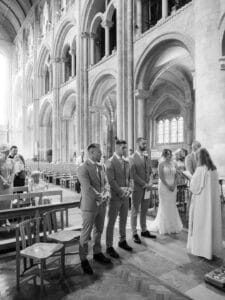 Bridal party at the head of the nave in Romsey Abbey