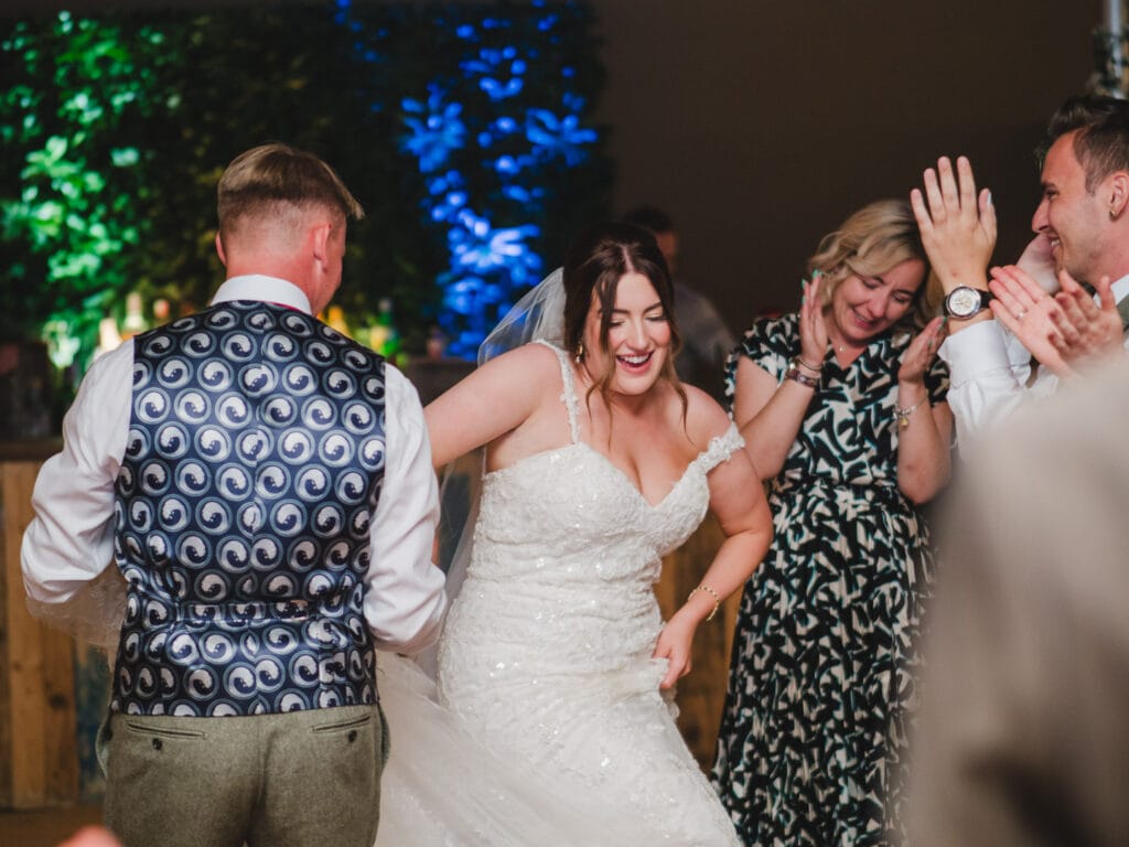 Bride and groom dancing at their marquee wedding