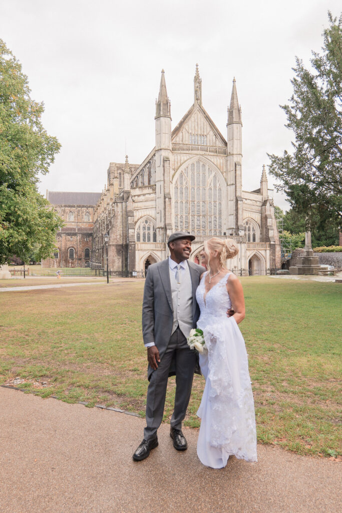 Winchester Cathedral wedding couple on the green