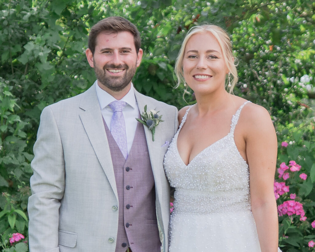 Bride and groom in the garden at Parley Manor